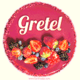 Beautifully decorated red velvet berry birthday cake with vibrant fruits and a glowing 'Gretel' name, adding a touch of sweetness and sparkle.