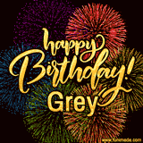 A vibrant display of multicolor fireworks with the text 'Happy Birthday Grey' written in gold, glowing beautifully in front of the explosive background.