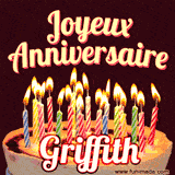A Happy Birthday GIF in French featuring a festive birthday cake adorned with bright candles and the glowing text 'Joyeux Anniversaire Griffith' in a cheerful style.