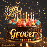 A chocolate drip birthday cake on a stand with colorful frosting and lit candles, featuring the name Grover in glowing yellow letters.