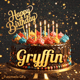 Animated chocolate cake for Gryffin's birthday with colorful whipped cream, burning candles, and a gold Happy Birthday topper.
