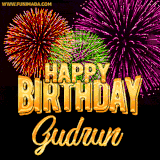 A golden 'Happy Birthday Gudrun' message with vibrant fireworks in the background, creating a festive and celebratory vibe in this animated name GIF.