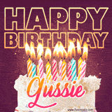 A colorful birthday cake topped with lit candles, with the words 'Happy Birthday Gussie' in bold glowing letters on a burgundy background. Animated flames add a festive touch.