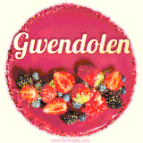 Beautifully decorated red velvet berry birthday cake with vibrant fruits and a glowing 'Gwendolen' name, adding a touch of sweetness and sparkle.