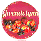 Beautifully decorated red velvet berry birthday cake with vibrant fruits and a glowing 'Gwendolynn' name, adding a touch of sweetness and sparkle.