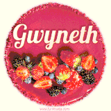 Beautifully decorated red velvet berry birthday cake with vibrant fruits and a glowing 'Gwyneth' name, adding a touch of sweetness and sparkle.
