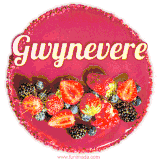 Beautifully decorated red velvet berry birthday cake with vibrant fruits and a glowing 'Gwynevere' name, adding a touch of sweetness and sparkle.