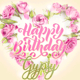 A stunning heart made of pink roses surrounds the elegant script text 'Happy Birthday Gypsy' on a soft beige background. Animated sparkles add a magical and festive feel.