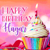 A vibrant birthday GIF featuring a rainbow-colored cupcake topped with white frosting, sprinkles, and a lit candle. The text reads 'Happy Birthday Hagar' in bold pink and violet letters with white outline.