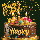 A delightful chocolate birthday cake with bright candles and 'Happy Birthday Hayley' written in gold amidst a shower of animated stars.