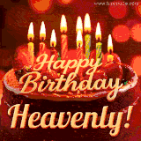 Beautifully decorated red velvet berry birthday cake with vibrant fruits and a glowing 'Heavenly' name, adding a touch of sweetness and sparkle.