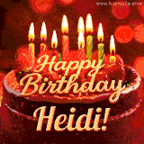 Beautifully decorated red velvet berry birthday cake with vibrant fruits and a glowing 'Heidi' name, adding a touch of sweetness and sparkle.