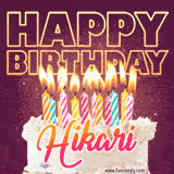A colorful birthday cake topped with lit candles, with the words 'Happy Birthday Hikari' in bold glowing letters on a burgundy background. Animated flames add a festive touch.