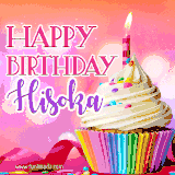 A vibrant birthday GIF featuring a rainbow-colored cupcake topped with white frosting, sprinkles, and a lit candle. The text reads 'Happy Birthday Hisoka' in bold pink and violet letters with white outline.