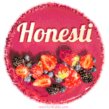 Beautifully decorated red velvet berry birthday cake with vibrant fruits and a glowing 'Honesti' name, adding a touch of sweetness and sparkle.