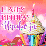 A vibrant birthday GIF featuring a rainbow-colored cupcake topped with white frosting, sprinkles, and a lit candle. The text reads 'Happy Birthday Hrodwyn' in bold pink and violet letters with white outline.