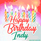 Bright birthday candles with rainbow flames on a cake, alongside the text 'Happy Birthday Indy' in vibrant script in this celebratory animated GIF.