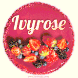 Beautifully decorated red velvet berry birthday cake with vibrant fruits and a glowing 'Ivyrose' name, adding a touch of sweetness and sparkle.