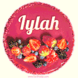 Beautifully decorated red velvet berry birthday cake with vibrant fruits and a glowing 'Iylah' name, adding a touch of sweetness and sparkle.