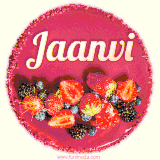 Beautifully decorated red velvet berry birthday cake with vibrant fruits and a glowing 'Jaanvi' name, adding a touch of sweetness and sparkle.