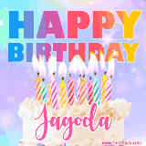 A vibrant animated name GIF with the words 'Happy Birthday Jagoda' with colorful candles on a creamy cake. The background sparkles with pastel shades, adding a festive touch.