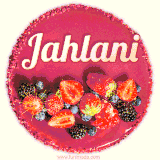 Beautifully decorated red velvet berry birthday cake with vibrant fruits and a glowing 'Jahlani' name, adding a touch of sweetness and sparkle.