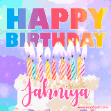 A vibrant animated name GIF with the words 'Happy Birthday Jahniya' with colorful candles on a creamy cake. The background sparkles with pastel shades, adding a festive touch.