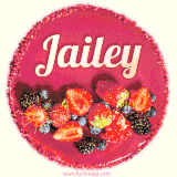 Beautifully decorated red velvet berry birthday cake with vibrant fruits and a glowing 'Jailey' name, adding a touch of sweetness and sparkle.