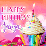 A vibrant birthday GIF featuring a rainbow-colored cupcake topped with white frosting, sprinkles, and a lit candle. The text reads 'Happy Birthday Jaiya' in bold pink and violet letters with white outline.