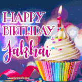 A festive animated GIF featuring a colorful cupcake with a single lit candle, sprinkles, and 'Happy Birthday Jakhai' text against a sparkling, celebratory background.