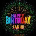 A colorful animated GIF featuring the text 'Happy Birthday Jakhi!' in rainbow colors with a dynamic iridescent firework display in the background.