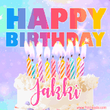 A vibrant animated name GIF with the words 'Happy Birthday Jakki' with colorful candles on a creamy cake. The background sparkles with pastel shades, adding a festive touch.