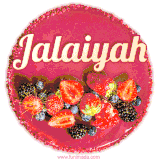 Beautifully decorated red velvet berry birthday cake with vibrant fruits and a glowing 'Jalaiyah' name, adding a touch of sweetness and sparkle.