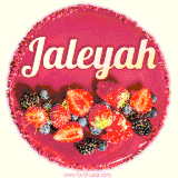 Beautifully decorated red velvet berry birthday cake with vibrant fruits and a glowing 'Jaleyah' name, adding a touch of sweetness and sparkle.