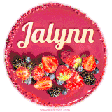 Beautifully decorated red velvet berry birthday cake with vibrant fruits and a glowing 'Jalynn' name, adding a touch of sweetness and sparkle.