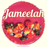 Beautifully decorated red velvet berry birthday cake with vibrant fruits and a glowing 'Jameelah' name, adding a touch of sweetness and sparkle.