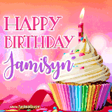 A vibrant birthday GIF featuring a rainbow-colored cupcake topped with white frosting, sprinkles, and a lit candle. The text reads 'Happy Birthday Jamisyn' in bold pink and violet letters with white outline.