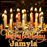 A glowing personalized birthday GIF with name Jamyla featuring lit candles with intricate designs, warm lighting, and the text 'Happy Birthday' in an elegant font.