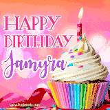 A vibrant birthday GIF featuring a rainbow-colored cupcake topped with white frosting, sprinkles, and a lit candle. The text reads 'Happy Birthday Jamyra' in bold pink and violet letters with white outline.