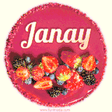 Beautifully decorated red velvet berry birthday cake with vibrant fruits and a glowing 'Janay' name, adding a touch of sweetness and sparkle.