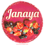 Beautifully decorated red velvet berry birthday cake with vibrant fruits and a glowing 'Janaya' name, adding a touch of sweetness and sparkle.