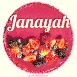 Beautifully decorated red velvet berry birthday cake with vibrant fruits and a glowing 'Janayah' name, adding a touch of sweetness and sparkle.