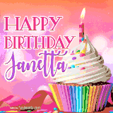 A vibrant birthday GIF featuring a rainbow-colored cupcake topped with white frosting, sprinkles, and a lit candle. The text reads 'Happy Birthday Janetta' in bold pink and violet letters with white outline.