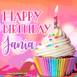 A vibrant birthday GIF featuring a rainbow-colored cupcake topped with white frosting, sprinkles, and a lit candle. The text reads 'Happy Birthday Jania' in bold pink and violet letters with white outline.