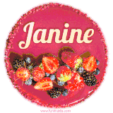 Beautifully decorated red velvet berry birthday cake with vibrant fruits and a glowing 'Janine' name, adding a touch of sweetness and sparkle.