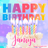 A vibrant animated name GIF with the words 'Happy Birthday Janiya' with colorful candles on a creamy cake. The background sparkles with pastel shades, adding a festive touch.