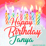Bright birthday candles with rainbow flames on a cake, alongside the text 'Happy Birthday Janya' in vibrant script in this celebratory animated GIF.