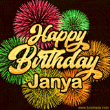 Golden text reading 'Happy Birthday Janya' surrounded by vibrant fireworks in red, green, and yellow, set against a dark background in this celebratory birthday GIF.