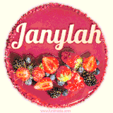 Beautifully decorated red velvet berry birthday cake with vibrant fruits and a glowing 'Janylah' name, adding a touch of sweetness and sparkle.