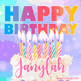 A vibrant animated name GIF with the words 'Happy Birthday Janylah' with colorful candles on a creamy cake. The background sparkles with pastel shades, adding a festive touch.